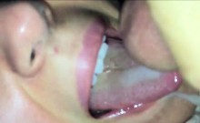 He releases his load of cum on her tongue