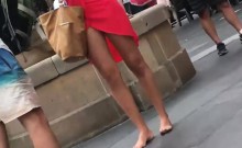 Woman that is bare footed and some upskirts
