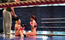 Lesbian babes enjoying naked wrestling
