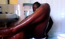 Young black amateur girls having lesbian sex in the toilets