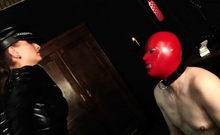 Domina Anna wrapped in shiny rubber